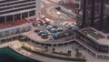 Car parking lot at waterfront viewed from above all day timelapse, Aerial view. Royalty Free Stock Photo