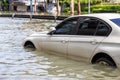 Car parking on the street and show level of water flooding in Ba Royalty Free Stock Photo