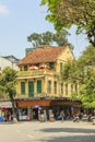 Car and people traffic in the city center. Typical cafes and restaurants Royalty Free Stock Photo