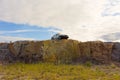 A car perched on a cliff in the northwest territories