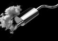 Car pipe exhaust fumes and smoke isolated over black background. Concept of pollution of the environment caused by automobiles Royalty Free Stock Photo
