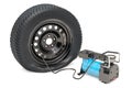 Car portable electric air compressor with puncture car wheel, 3D rendering