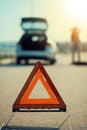 Car problems, red warning triangle! Royalty Free Stock Photo