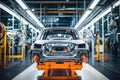 Car production line. Assembling a car on a conveyor belt. Close-up of a car body. Automotive industry Interior of a high-tech