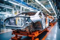 Car production line. Assembling a car on a conveyor belt. Close-up of a car body. Automotive industry Interior of a high-tech