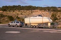 Car pulls yacht on trailer Royalty Free Stock Photo