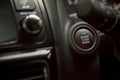 Car Push start.Closeup a start button of a car while steering the car. Royalty Free Stock Photo