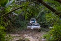 Car racing offroad. Pick-up truck is off road the mud in the forest. Off road vehicle coming out of a mud in forest Royalty Free Stock Photo