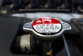 Car radiator cap with warning sign Royalty Free Stock Photo