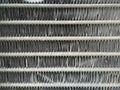 Car radiator honeycomb textured for background. Depth of field