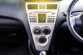 Car radio and air conditioner system,Button on dashboard in dirty car Royalty Free Stock Photo