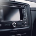 Modern car audio system, control buttons. Royalty Free Stock Photo