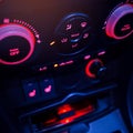 Button on dashboard in modern car panel. Royalty Free Stock Photo