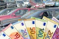 Car recycling and money Euro banknotes