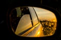 car reflection in the rearview mirror, sunset Royalty Free Stock Photo