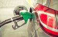 Car refueling at the petrol station. Concept photo for use of fuels gasoline, diesel, ethanol in combustion engines, pollution. Royalty Free Stock Photo