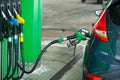 Car refueling on a petrol station in winter Royalty Free Stock Photo