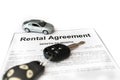 Car rental agreement with car on center Royalty Free Stock Photo