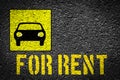 Car rental sign on the asphalt Royalty Free Stock Photo
