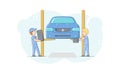 Car Repair Shop Concept. Professional Mechanics In Uniform Changing Vehicle Tires Using Tools And Car Lift. Male Royalty Free Stock Photo