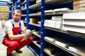 Car repair shop employees in the warehouse for spare parts for r Royalty Free Stock Photo