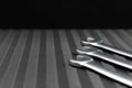 Car repair tools, wrench tool set on a black texture background Royalty Free Stock Photo