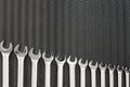 Car repair tools, wrench tool set on a black texture background Royalty Free Stock Photo