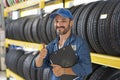 Car repairs. Auto services and Small business concepts. A car mechanic showing his thumb up Royalty Free Stock Photo