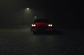 Car.  Retro.  Retro car.  Plymouth.  Plymouth Fury.  Red car.  Car on the road.  Car at night. Car in the rain Royalty Free Stock Photo