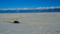 Car rides the harms of sand dunes from gypsum to White Sands National Monument, New Mexico, USA