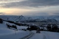 Car riding into the front of nature at Lofoten islands of Norway. Royalty Free Stock Photo