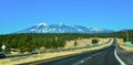 Car road against the backdrop of snow-capped mountains in winter in Arizona Royalty Free Stock Photo