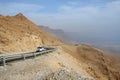 Car on the road in Judean desert near Dead Sea,Israel,MidEast