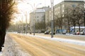 Car on the road in village with snow and sunrise in winter season at Helsinki, Finland