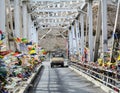 A car running on the steel bridge at Zanskar valley in Ladakh, India Royalty Free Stock Photo