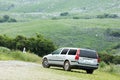 A car that runs exhilaratingly in the meadow