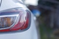 Car`s exterior details.Element of design.Rear light. Rear light of a modern white car Royalty Free Stock Photo