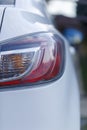 Car`s exterior details.Element of design.Rear light. Rear light of a modern white car Royalty Free Stock Photo