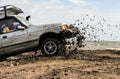 A car`s racing in mud during an off-road racing competition. Royalty Free Stock Photo