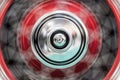 Car's wheel rotating fast with blur. Royalty Free Stock Photo