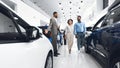 Car Sales Manager Showing Auto To Buyers In Dealership Store