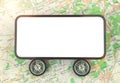 Car sharing and car rental mobile app concept, mobile phone with wheels mockup blank white screen on a city map, copy Royalty Free Stock Photo