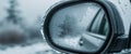 Car side mirror view with winter condensation. Royalty Free Stock Photo