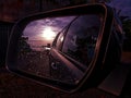 car side wing mirror sunset view Royalty Free Stock Photo