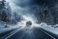 Car on a snowy road at night, winter forest landscape, winter travel in a blizzard Royalty Free Stock Photo