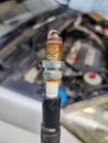 A car spark plug is a part of a gasoline engine. Royalty Free Stock Photo