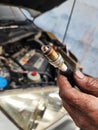 A car spark plug is a part of a gasoline engine. Royalty Free Stock Photo