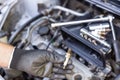 Car spark plug replacement. Repairing of vehicle. Royalty Free Stock Photo