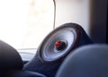 Car speaker. Modern car sound speaker with red details Royalty Free Stock Photo