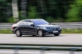 Luxury Mercedes-Benz speeding on empty highway Royalty Free Stock Photo